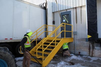 Building Exterior Maintenance of a steel stairwell for a loading dock 