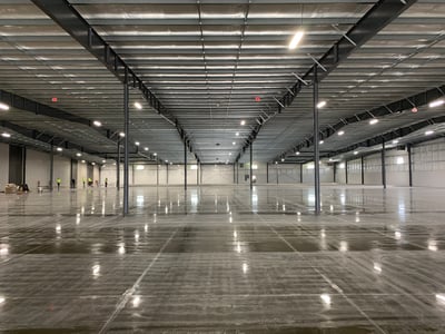 The inside of a ware-house or manufacturing facility that was designed with air conditioning for the benefit of employees