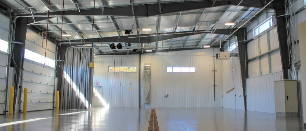 an industrial building with lots of natural light