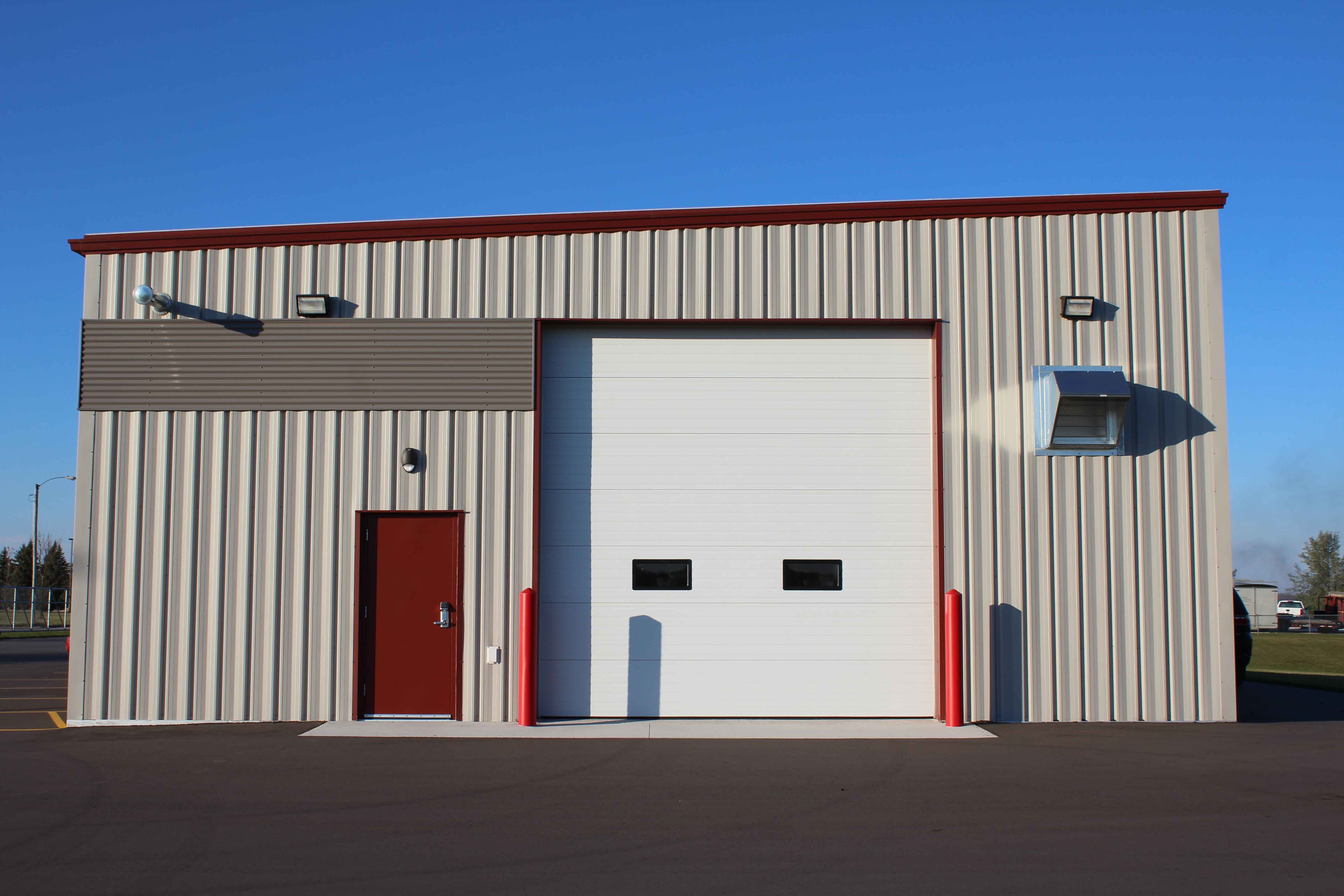 Fleet Maintenance Shop Construction Shot of Exterior Garage Door