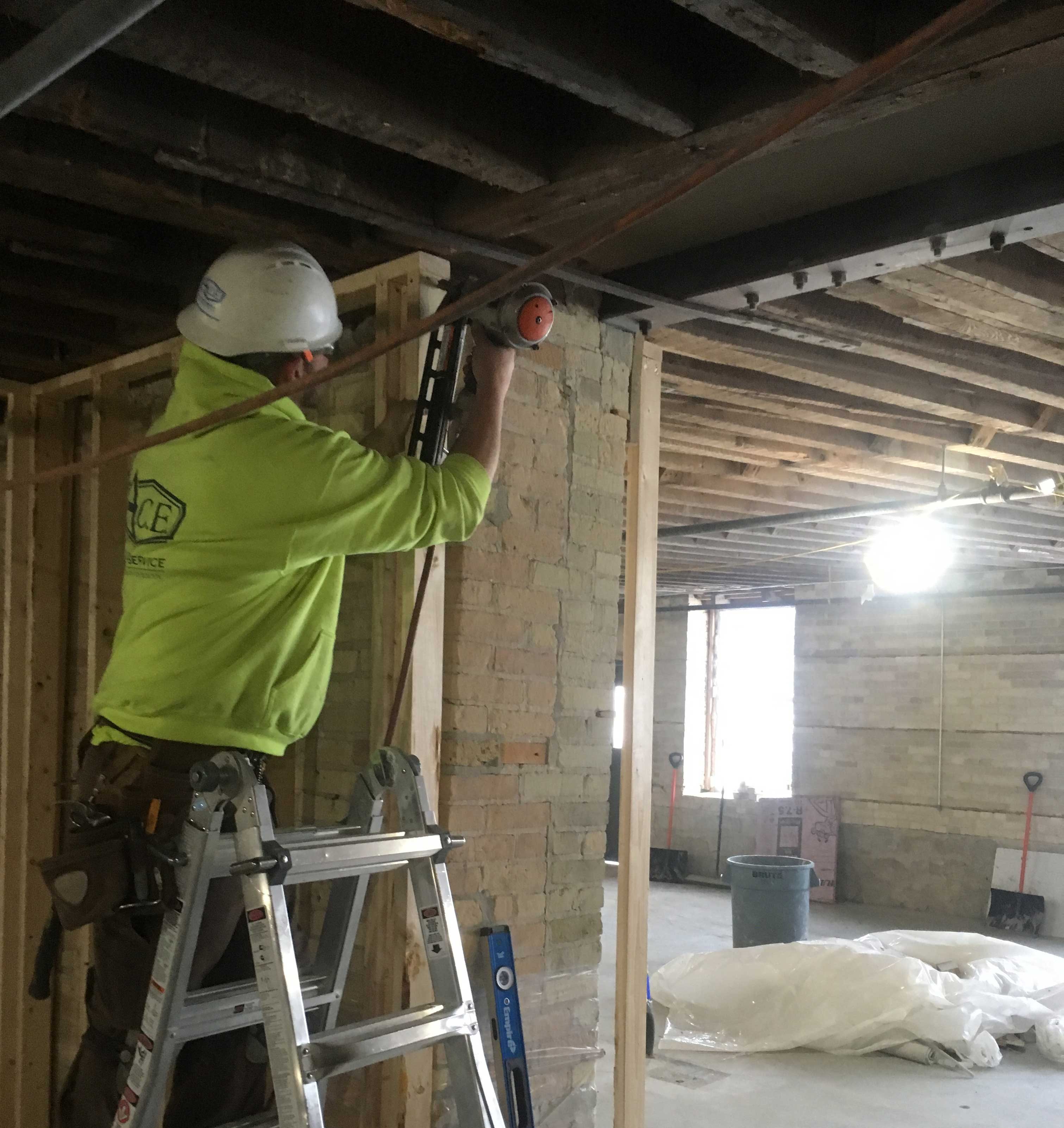 Structural wall reinforcement at bar and restaurant construction project in Manitowoc Wisconsin.